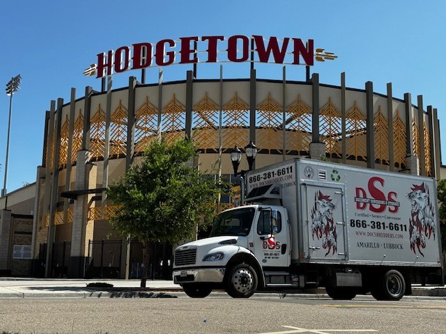 A DSS mobile shredding truck parked in front of a Hodge town building in Amarillo, TX
